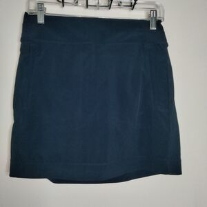 Athleta (Sz 6) Navy Blue Stretch Built-in Shorts Slip Zip Pocket Athletic Skort